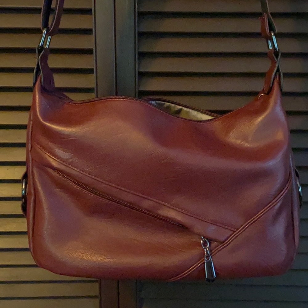 Crossbody or shoulder bag burgundy only used once